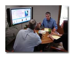 Image of divorce mediation using large flat panel displays to facilitate planning discussions - ©, 2006 